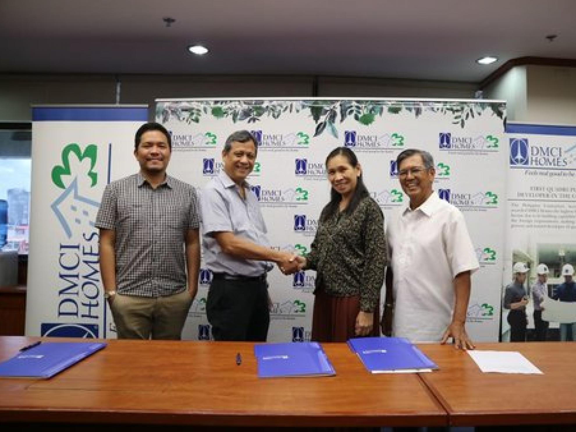 Photo shows (from left to right) DMCI Homes AVP for Marketing Jan Venturanza, DMCI Homes President Alfredo R. Austria, UP College of Engineering Dean Rizalinda de Leon, and UPERDFI Alfonso Aliga, Jr. after the signing of the agreement at the DMCI Homes Co