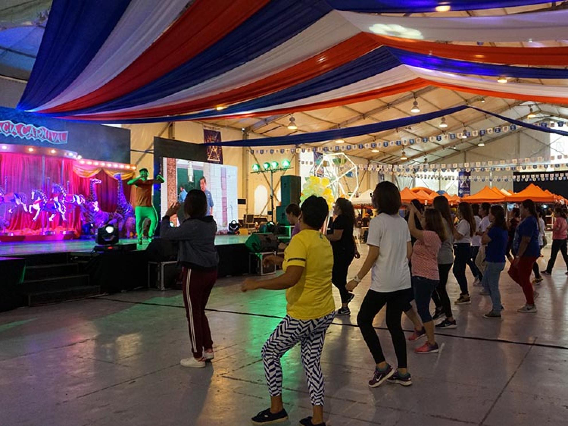 Residents of DMCI Homes' Acacia Estates get in the Zumba groove.